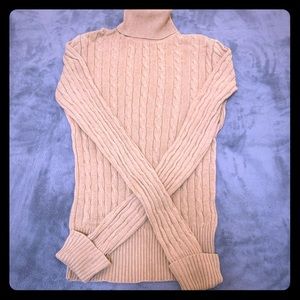 Extra long sleeve cable knit turtleneck sweater